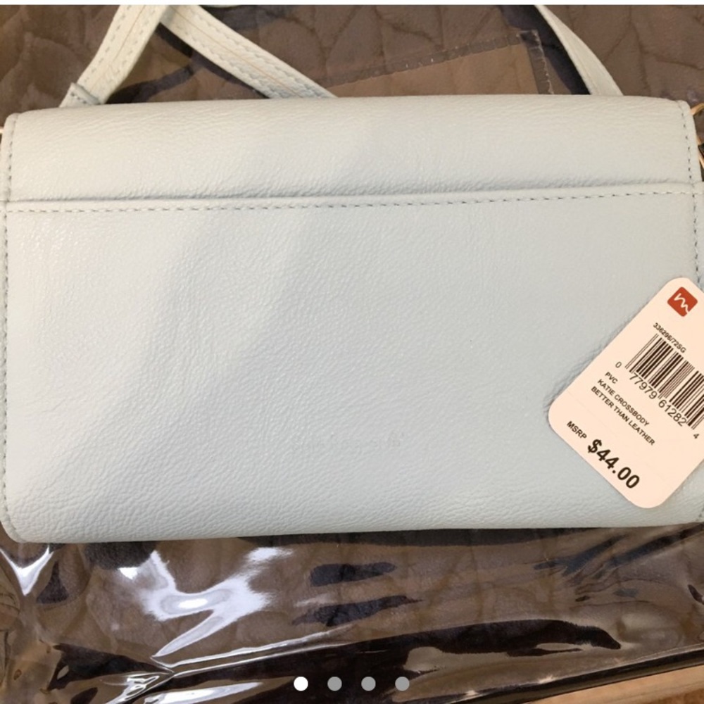 Katie Crossbody bag 
Tag attached
Color: ice blue